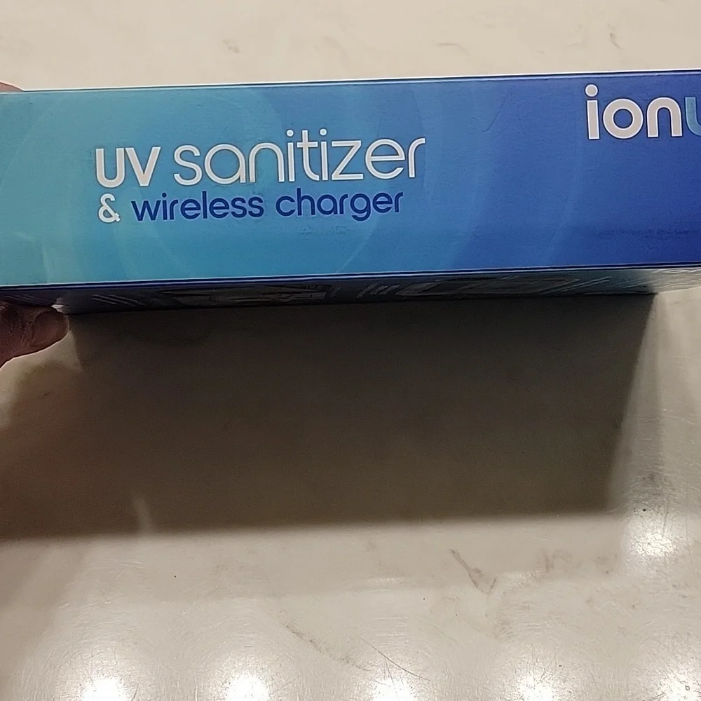 Wireless charger and UV sanitizer